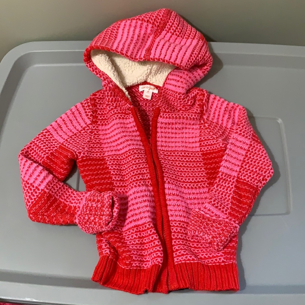 Pink and red zip up sweater
